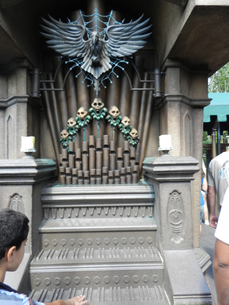 Haunted Mansion Magic Kingdom Secrets at Disney with Organ covered in Skulls. Photo copyright ThemeParkHipster. Keep reading to get the best Disney Magic Kingdom secrets and fun facts.