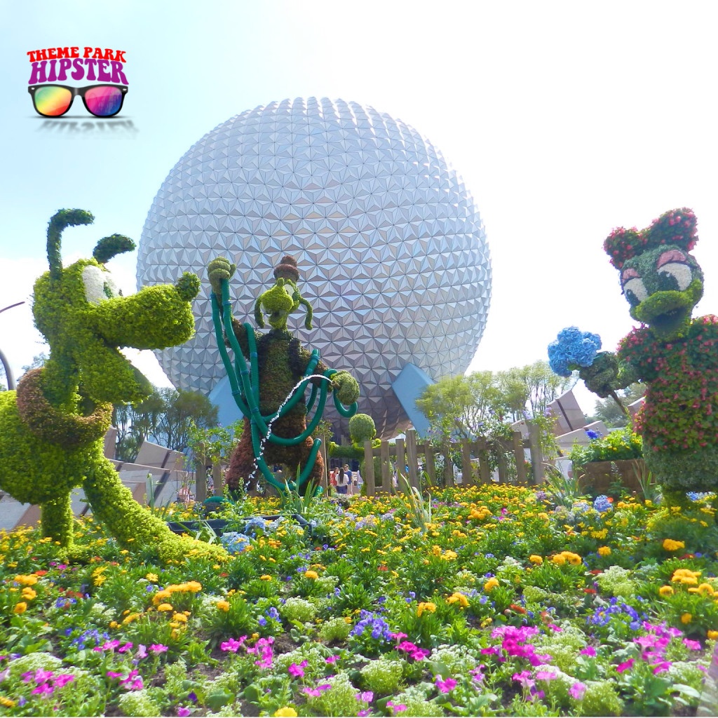Epcot Flower & Garden Festival Concerts guide with Pluto, Daisy and Goofy topiary in front of Spaceship Earth.