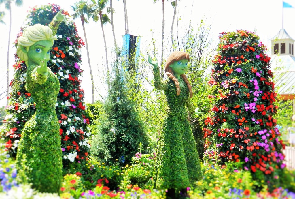 Frozen Ever After Ana and Elsa Topiary at Epcot Flower and Garden Festival. Keep reading to learn how to go to Epcot Flower and Garden Festival alone and how to have the perfect solo Disney World trip.