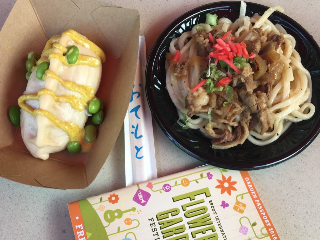 japan pavilion flower and garden festival food with udon noodles. Keep reading to learn how to do Disney World on a Budget for a solo trip.