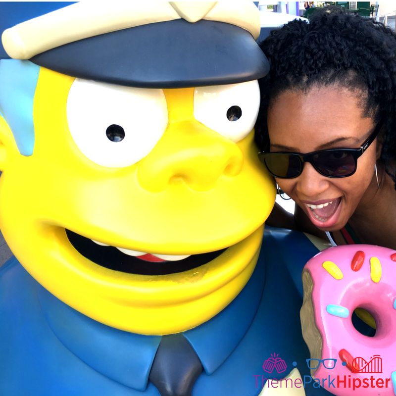 Simpsons Springfield universal studios cop and doughnut universal solo. Keep reading to learn how to have the best Universal Orlando Solo Trip for Travelers going to theme parks alone.
