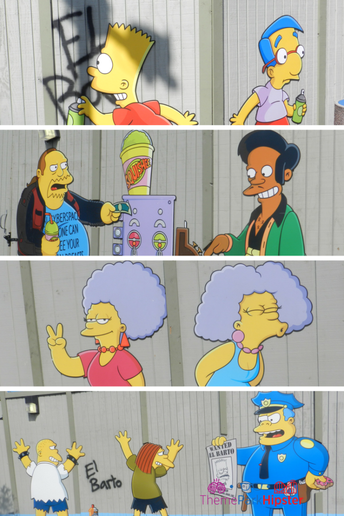 Simpsons Universal Studios Florida with various characters painted on gray fence next to Cletus' Chicken Shack