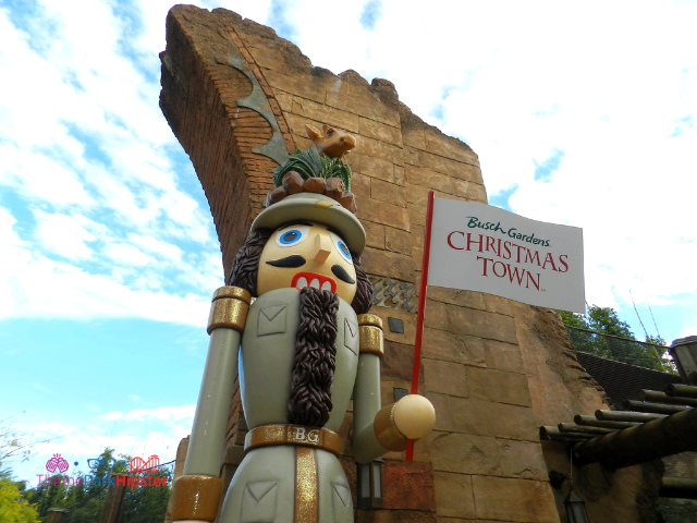 2023 Christmas Town Busch Gardens with wooden toy soldier. Keep reading to get the full guide on doing Christmas at Busch Gardens Tampa!