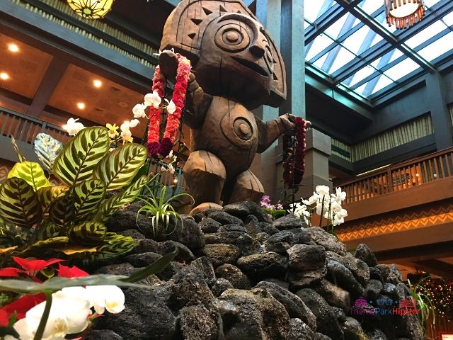 Christmas at the Polynesian Resort with Tiki God in Holiday Garb. Disney monorail resorts to stay at.