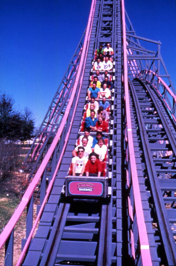 View showing visitors riding the Florida Hurricane roller coaster at the Boardwalk and Baseball theme park in Haines City, Florida
