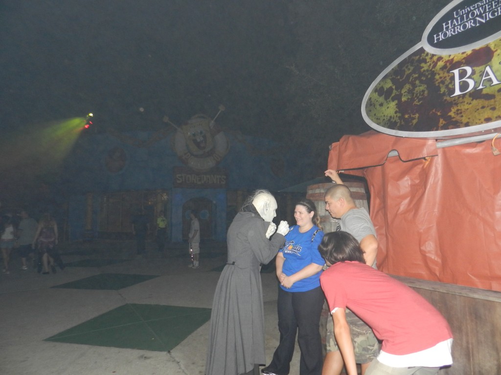 People getting scared at Halloween Horror Nights 2012. Keep reading for more HHN 22 tips.