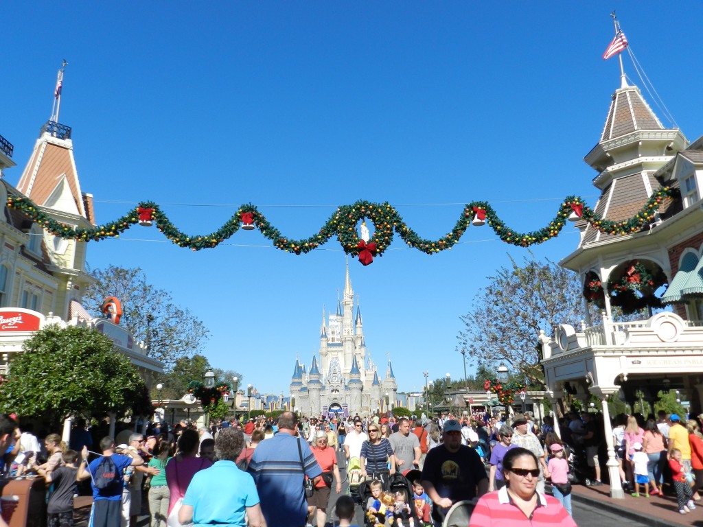 Magic Kingdom Christmas on Main Street USA. Keep reading to learn about Magic Kingdom for adults the Disney grown up way.