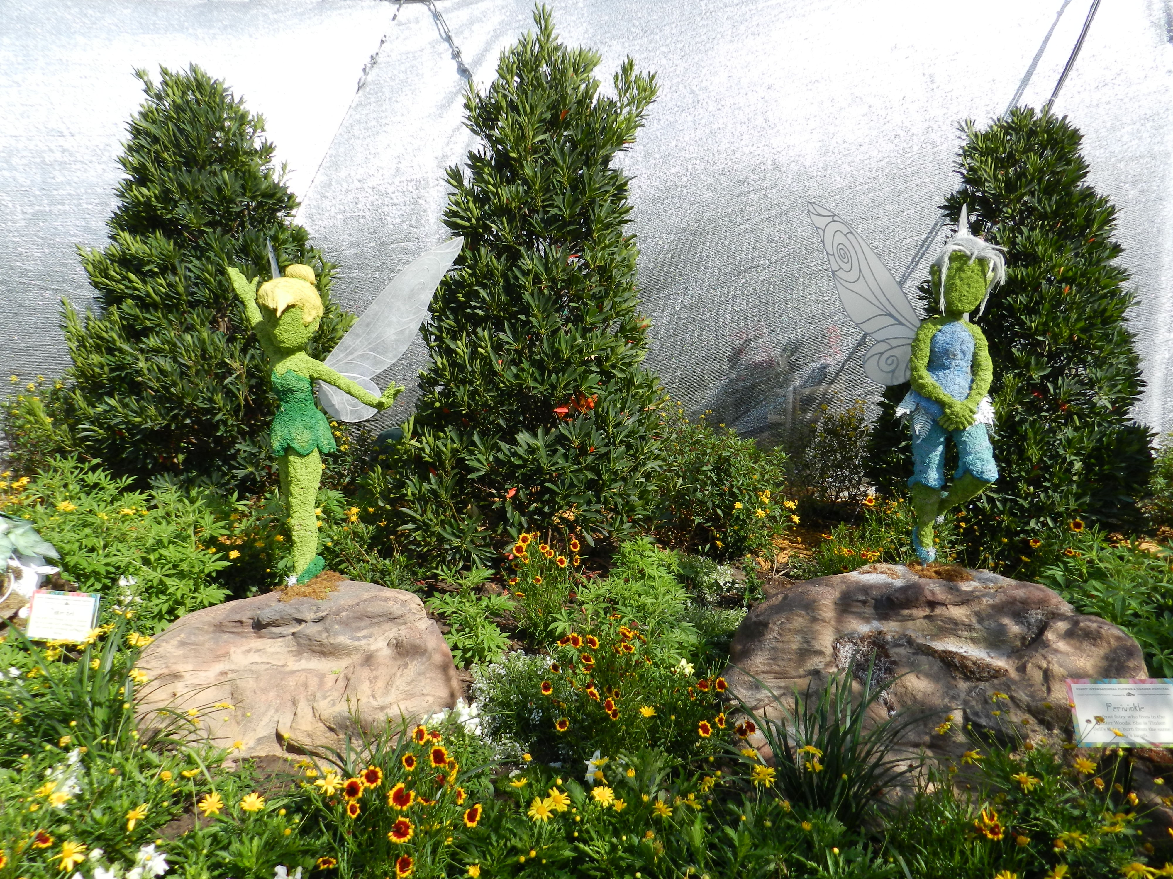 Tinkerbell and Periwinkle Fairy Topiary. Epcot Flower and Garden Festival one-day itinerary with colorful topiary.