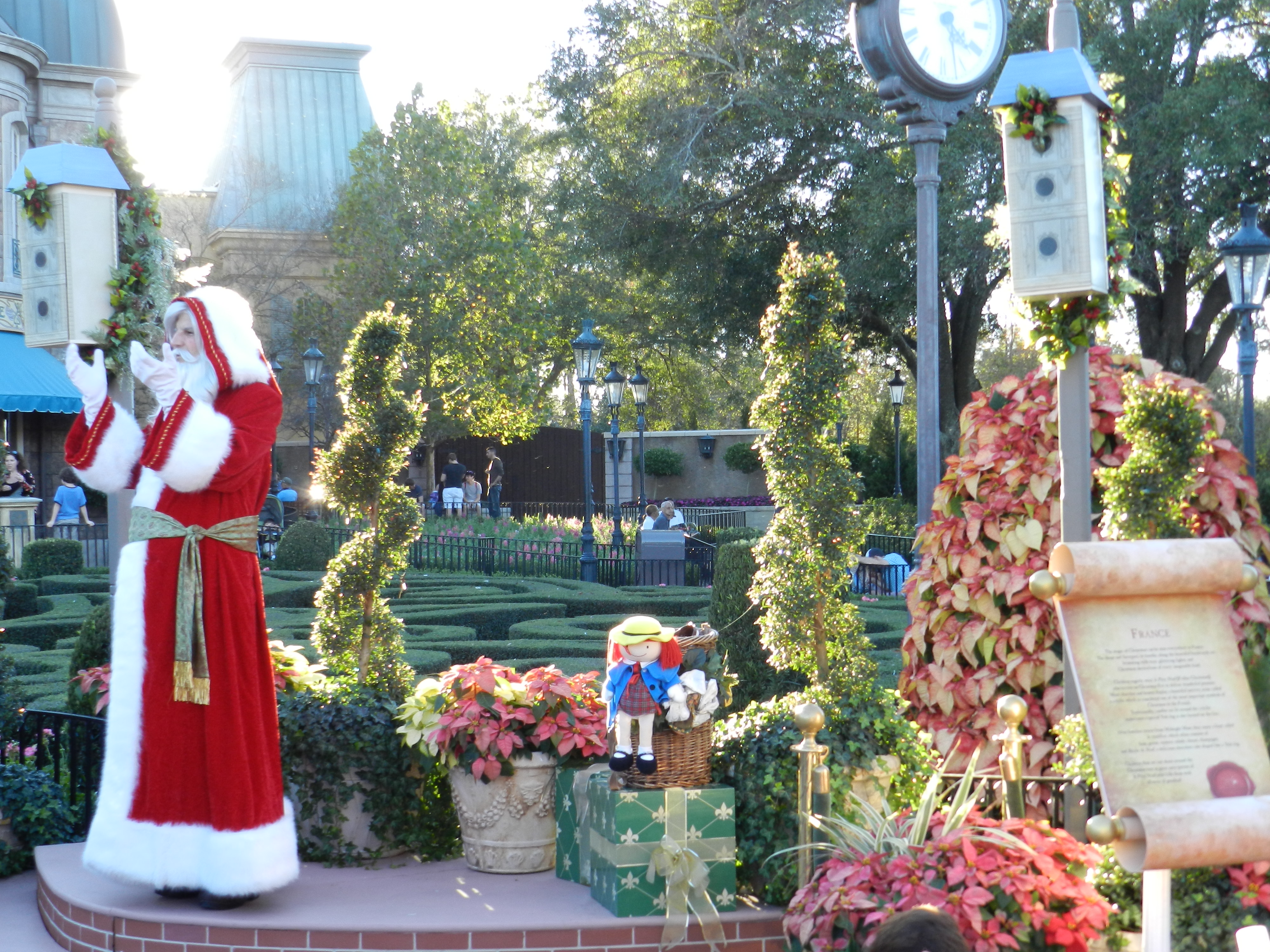 Epcot Festival of the Holidays with Pere Noel in France giving story. Disney Epcot at Christmas.