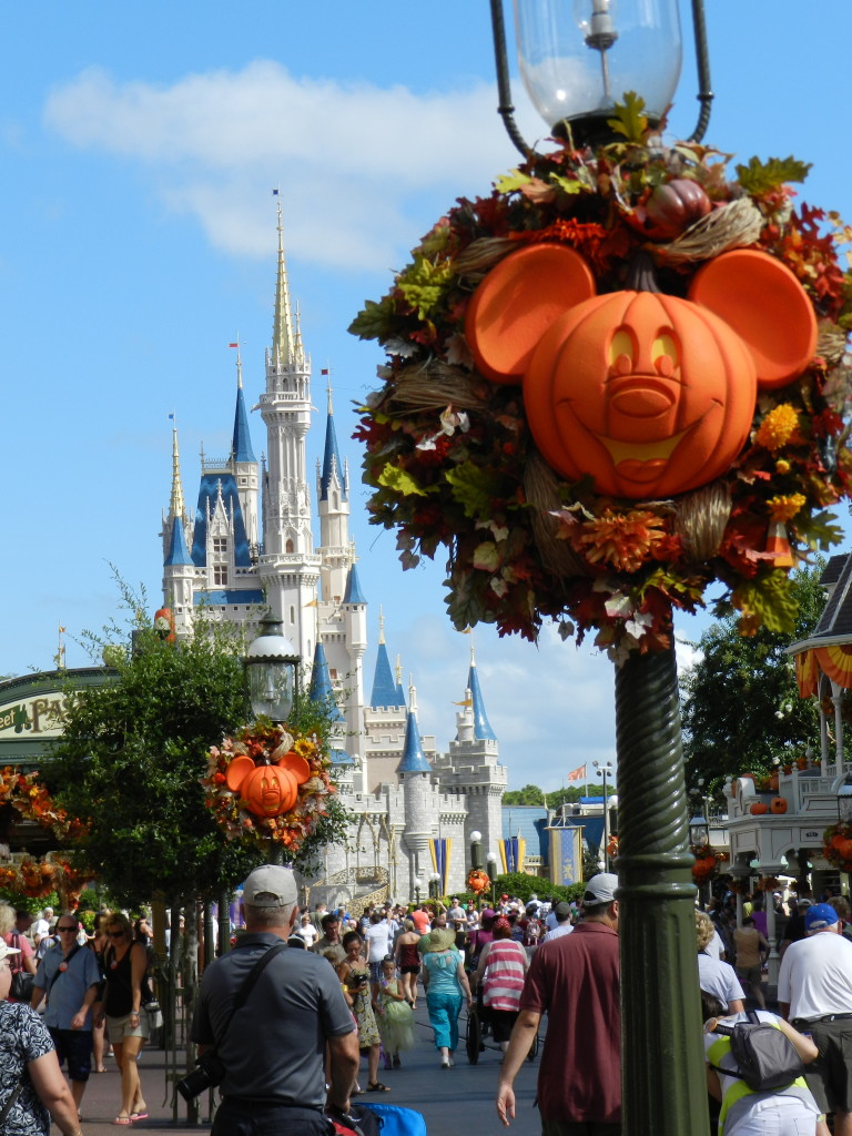 Fall at Disney World with Mickey face pumpkins. Keep reading for more Halloween at Disney things to do and events with fall decor. Photo Copyright ThemeParkHipster.