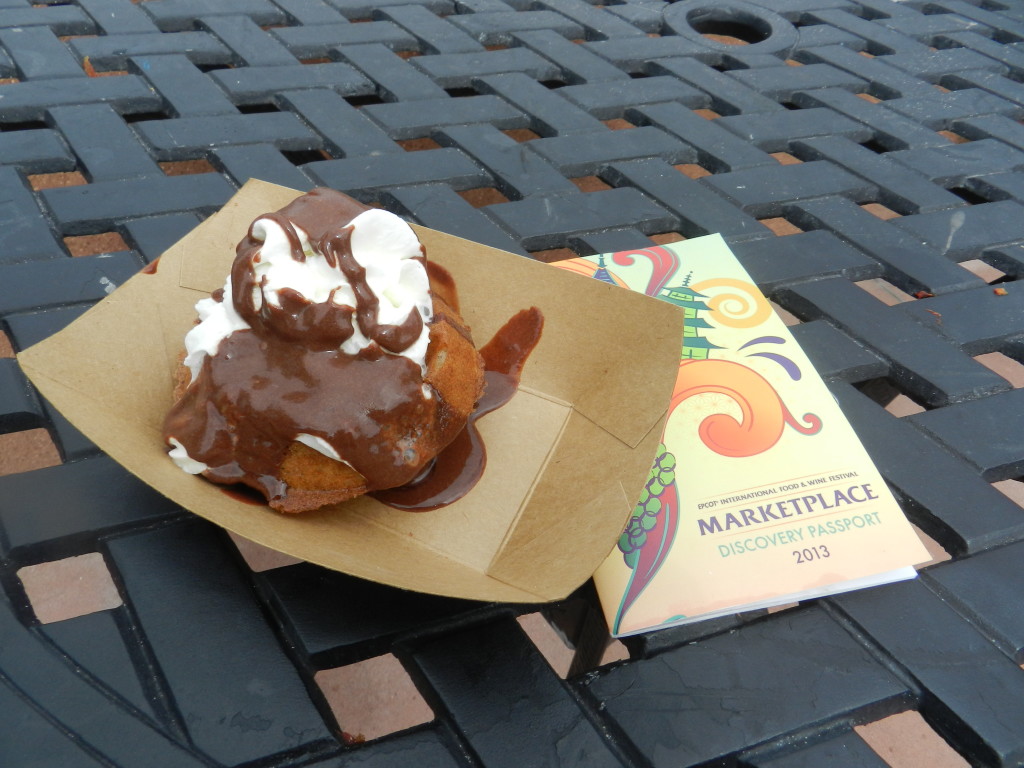 Belgium Marketplace: Belgian Waffle with Warm Chocolate Ganache & Whipped Cream Epcot Food and Wine Festival Menu. Keep reading to learn about the best food at Epcot Food and Wine Festival!