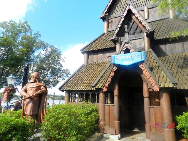 Norway Pavilion in Epcot at Disney with Viking in front of Stave House.