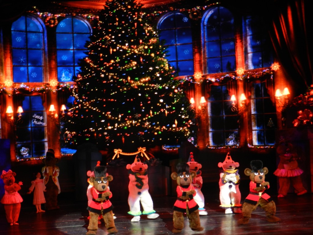 Radio City Christmas Spectacular with Rockettes in Teddy Bear Gear Near Christmas Tree