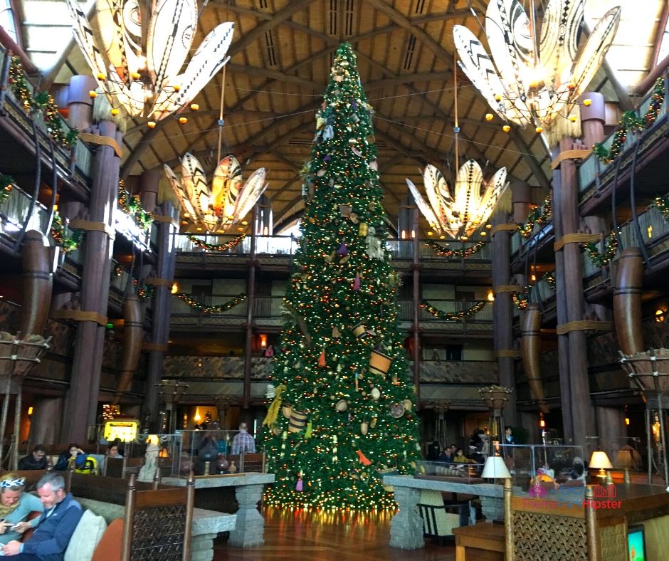 Disney Christmas Tree in Lobby at Animal Kingdom Lodge. Keep reading to learn about the best Disney Resorts at Christmas!