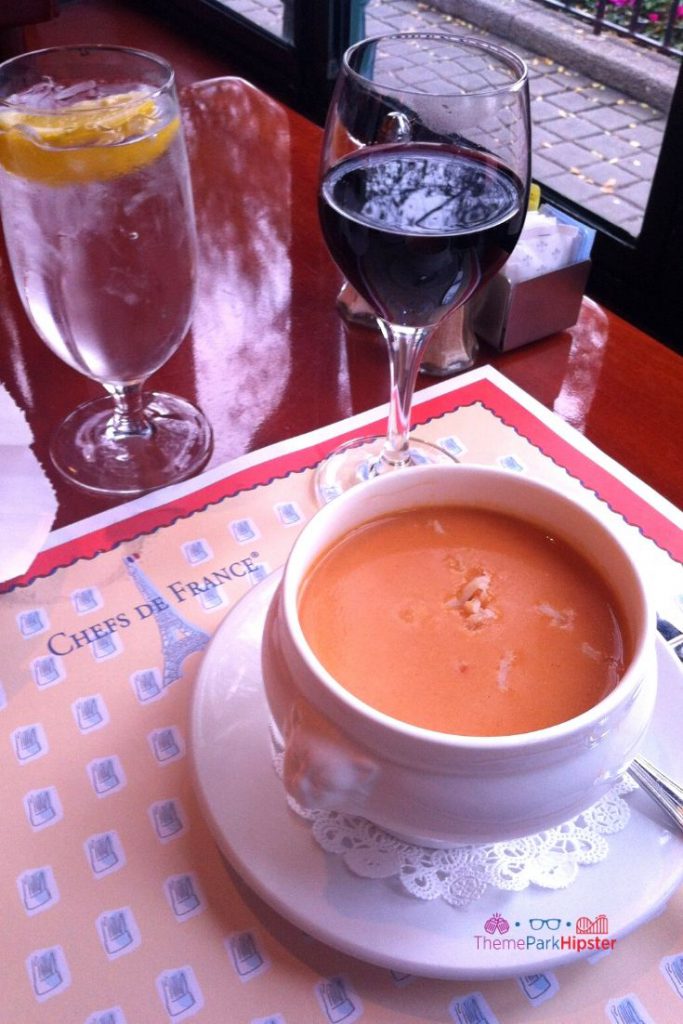 Creamy Lobster Bisque and Red Wine at Chefs de France Disney World. One of the best disney world restaurants.