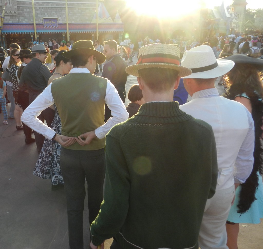 Waiting for pics at the carousel in Fantasyland how to dress for dapper day