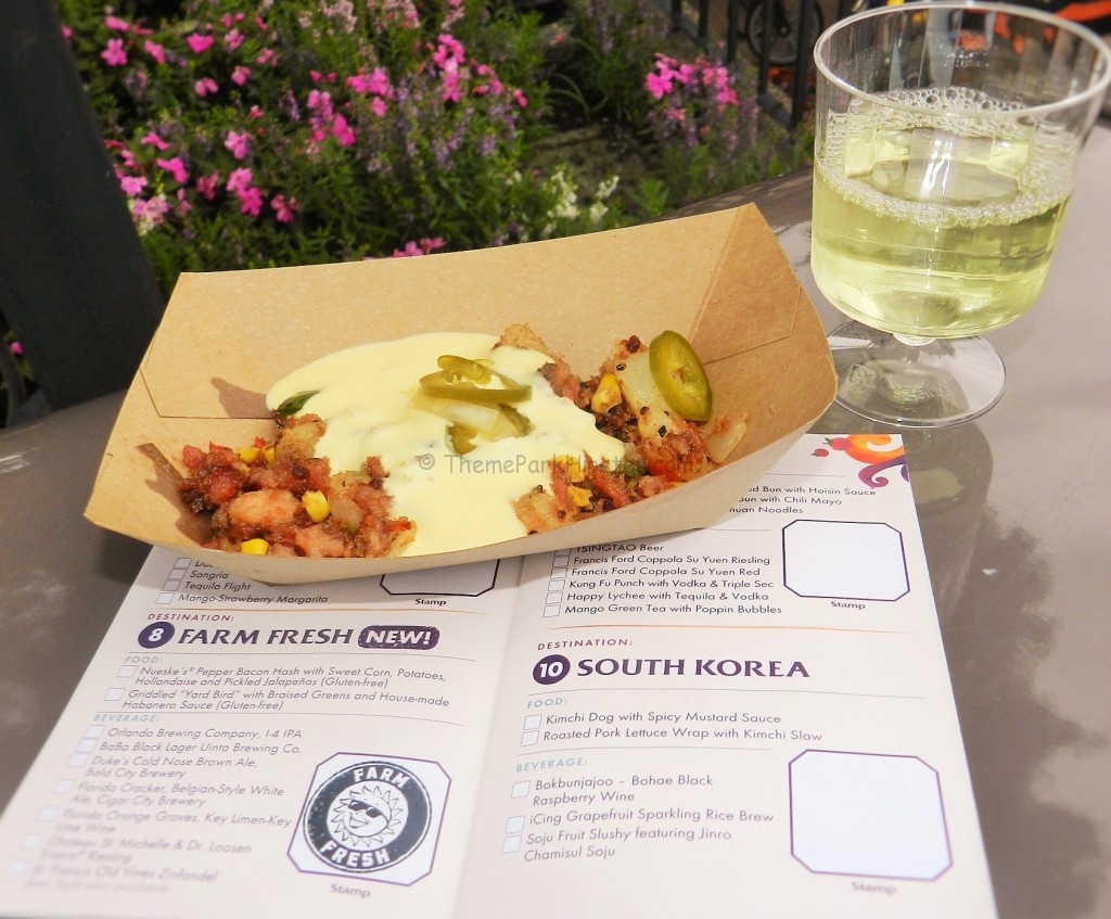 2024 Epcot Food and Wine Festival. Potato hash with creamy cheese and jalapeño peppers on top. Keep reading to get the best Epcot Food and Wine Festival Tips!