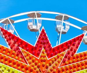 Red Orange and Yellow Ferris Wheel. How to Beat the Florida Heat at Theme Parks