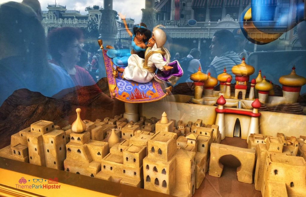 Jasmine and Aladdin Flying on Carpet at the Magic Kingdom. Keep reading to get the best movies to watch for Disney World Magic Kingdom.