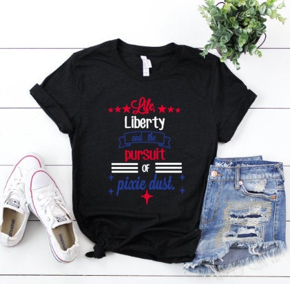Pixie Dust Disney World 4th of July red, blue, and white words on blackshirt