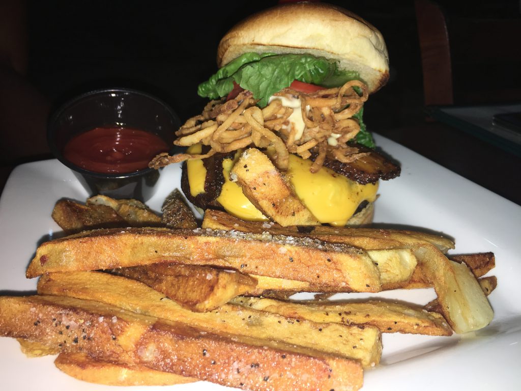 19 reasons you'll love CLC Regal Oaks. House Smoked Ancho Chili Rubbed Bacon Burger had crunchy romaine hearts, a ripe heirloom tomato, crispy fried onion, roasted garlic aioli, and aged cheddar.