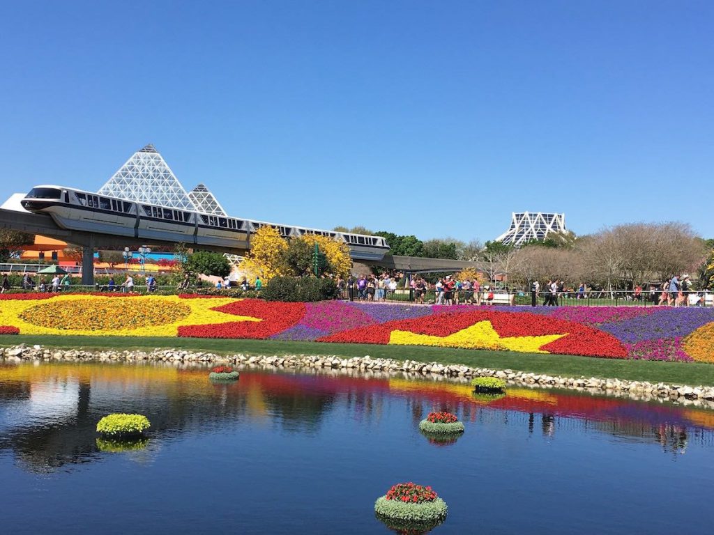 Epcot Flower and Garden Festival one-day itinerary with colorful topiary. Making it good to know how much does Disney World Cost.