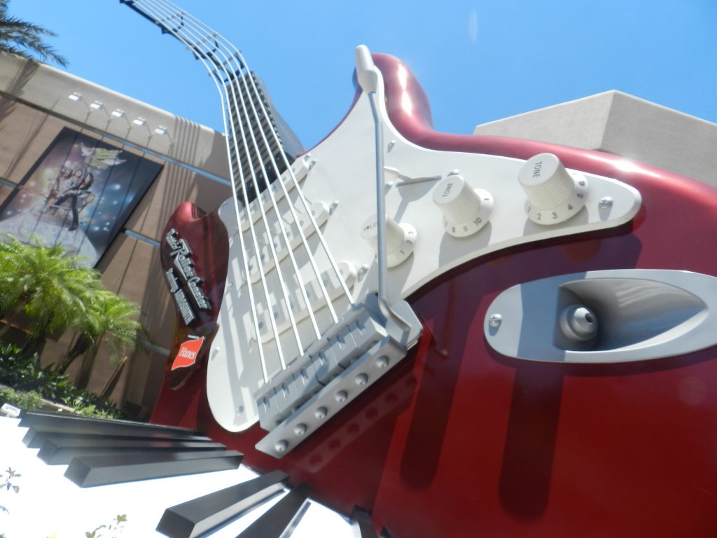 Hollywood Studios Aerosmith Roller Coaster with large red and white guitar on Rock n Roller Coaster.