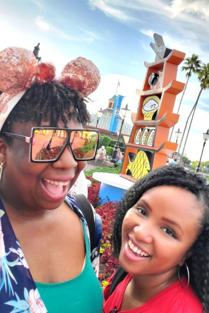 Epcot Food and Wine Festival with Outdoorsy Diva and NikkyJ of ThemeParkHipster. Keep reading to learn how to socialize on your solo theme park trip and how to talk to people.