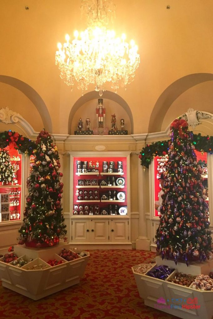 Epcot International Festival of the Holidays Germany Pavilion Christmas Tree Store. Keep reading to get the best Disney Christmas treats and desserts on this foodie guide.