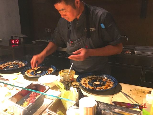 Morimoto Asia Chef Creating Sashimi Masterpiece in Disney Springs