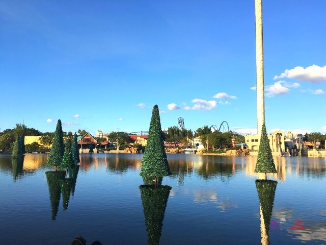 SeaWorld Christmas Celebration Sea of Trees with Roller Coasters in background