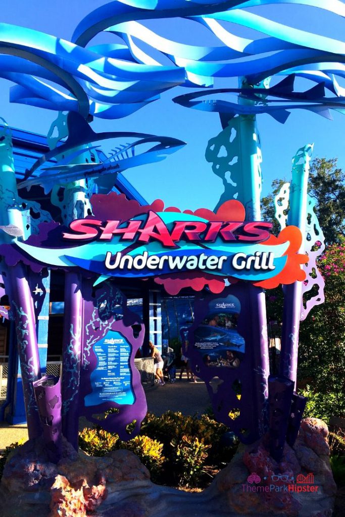 Sharks Underwater Grill in SeaWorld Orlando Sign. Keep reading to learn more about the best SeaWorld Orlando restaurants.