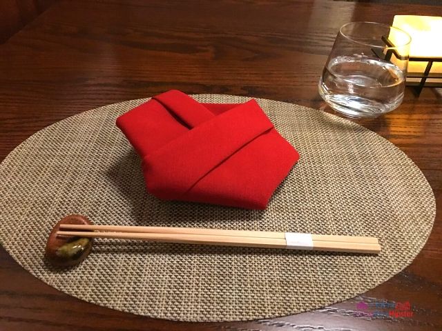 Takumi Tei Japanese Restaurant Epcot Table Setting with Red Napkin 