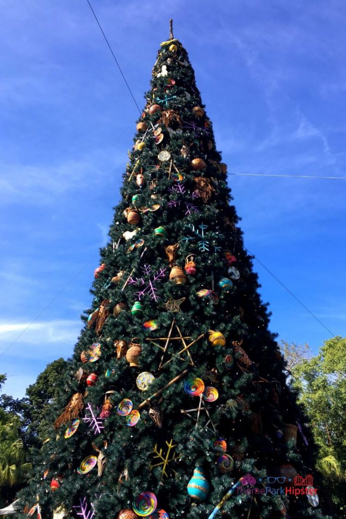 Animal Kingdom Christmas Tree in the Front Entrance. Keep reading to learn about the best Disney Christmas trees!