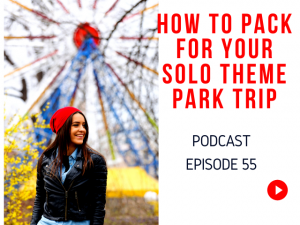 How to Pack for Your Solo Theme Park Vacation with Woman standing in front of Ferris Wheel with red hat.