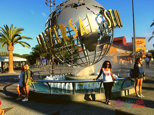 Universal Studios Hollywood California Globe with NikkyJ. Take a photo at the iconic globe. One of the top Universal Studios Hollywood tips!