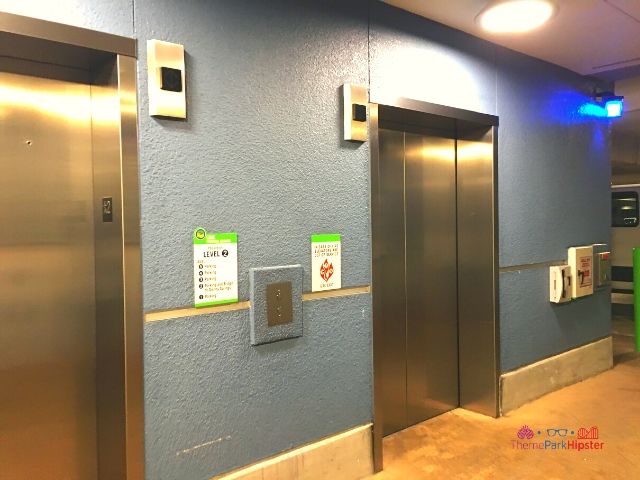 Lime Garage Elevator Entrance. Keep reading to learn more about Disney Springs parking.