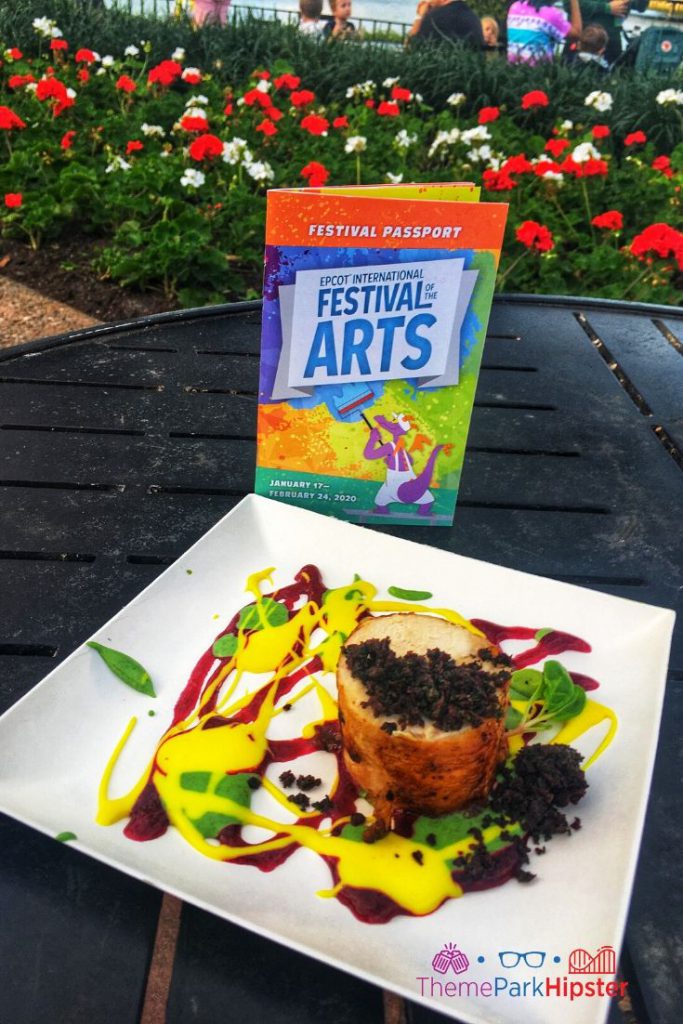 Epcot Festival of the Arts POP Eats Chicken Art. Keep reading for the best food at Epcot Festival of the Arts.