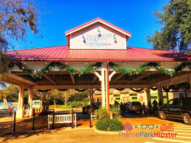 Port Orleans Riverside Resort Front Entrance with carport. Keep reading to learn about the best Disney Christmas trees!