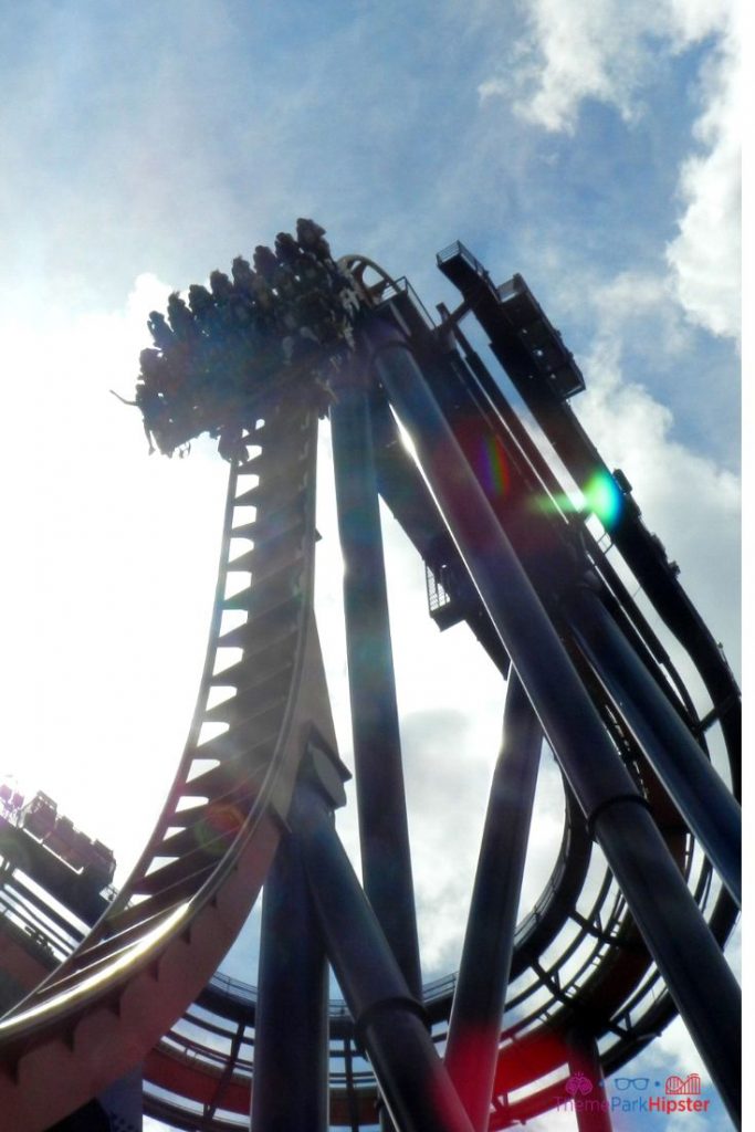 Sheikra roller coaster at Busch Gardens with People Hanging in the Air in the Florida sun. One of the best roller coasters at Busch Gardens Tampa.