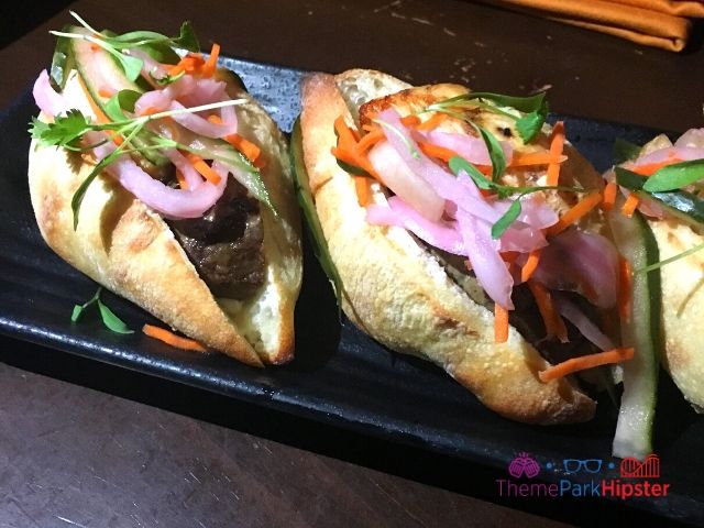 Trader Sam Grog Grotto Roasted Chicken and Pork Pâté Bánh Mì Sliders. Keep reading to know how to choose the best Disney Deluxe Resorts for your vacation.