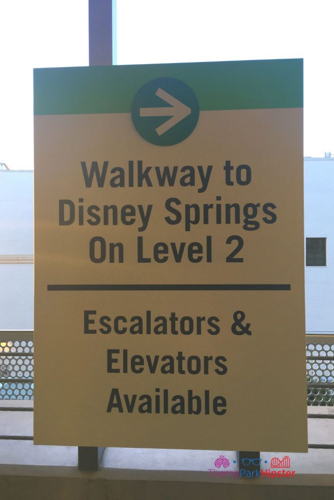 Walkway to Disney Springs Sign on Level Two. Keep reading to find out all you need to know about parking at Disney Springs.