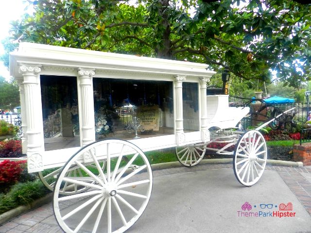 Disneyland white carriage outside ride. Keep reading for Disney World Haunted Mansion secrets and facts.