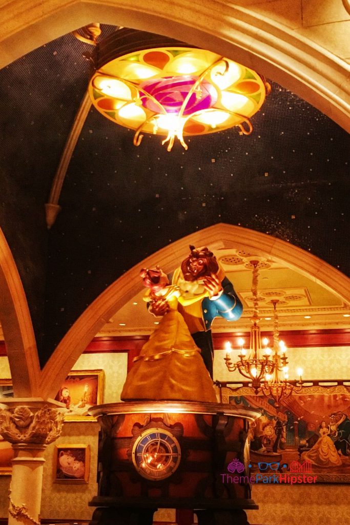 Be Our Guest Restaurant Rose room with Bell and Beast Dancing. Keep reading to get the best Disney Christmas movies and films!