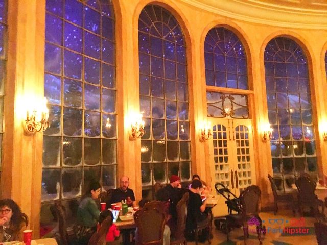 Be Our Guest Restaurant with Ballroom with snow in the window 