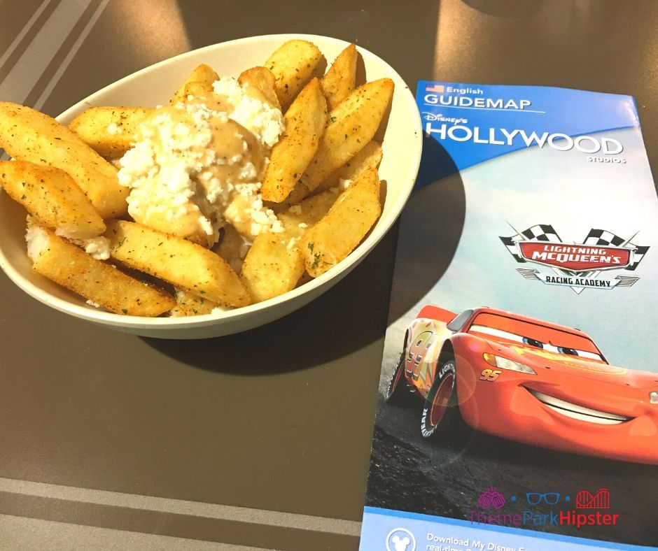 ABC Commissary Hollywood Studios Fries with gravy and cheese. Keep reading to find out more about Disney World Mobile Order Service.