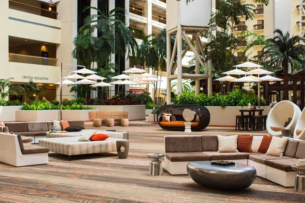 Atrium Sitting Area Renaissance Orlando SeaWorld. Keep reading for the best resorts in Orlando that are not Disney.
