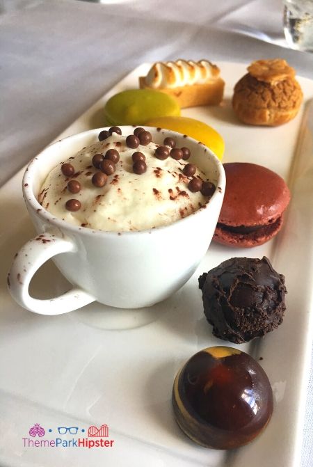 Monsieur Paul at Epcot Dessert Platter with multi color macaroons on white plate