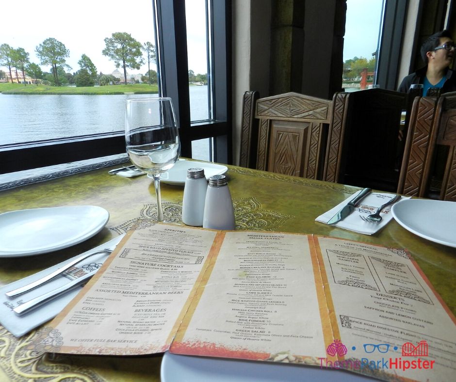 Spice Road Table at Epcot Menu on Table Overlooking Lagoon 
