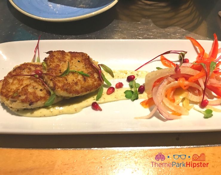 Living Seas restaurant at Epcot Crab Cake over carrot and onion salad 